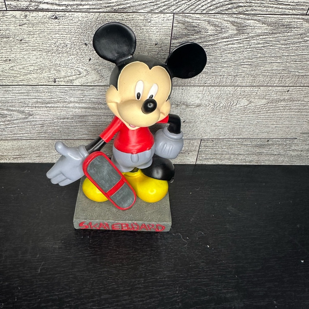 Retired Mickey Mouse "Mouseskateer" figurine from the "InspEARations"